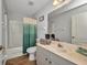 Clean bathroom featuring a shower-tub combination, a vanity, and coordinated towels with tasteful decorations at 9582 Arsipe Cir, Port Charlotte, FL 33981