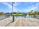 Waterfront dock overlooking canal with boat docks and landscaping at 9582 Arsipe Cir, Port Charlotte, FL 33981