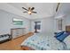 Well-lit bedroom offering direct access to pool area with ample natural light at 9582 Arsipe Cir, Port Charlotte, FL 33981