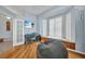 Comfortable office featuring a bay window with shutter blinds and a large beanbag chair at 9582 Arsipe Cir, Port Charlotte, FL 33981