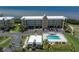 Enjoy this building's outdoor pool and lounge area overlooking the water at 101 N Marion Ct # 133, Punta Gorda, FL 33950