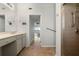 Bathroom with a glass shower, vanity, and view of the living room at 101 N Marion Ct # 133, Punta Gorda, FL 33950