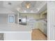 Modern kitchen with stainless steel appliances, light cabinetry, and a center island at 101 N Marion Ct # 133, Punta Gorda, FL 33950