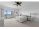 Bright main bedroom with water view, balcony access, and ensuite bathroom at 101 N Marion Ct # 133, Punta Gorda, FL 33950