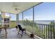 Relax on the screened lanai with views of lush greenery and the tranquil waterfront at 101 N Marion Ct # 133, Punta Gorda, FL 33950