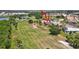 Aerial view of the property, highlighting the golf course and surrounding greenery at 10263 Shadow Run Cir, Punta Gorda, FL 33955