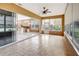 Bright sunroom with tile floor, offering seamless indoor-outdoor living at 10263 Shadow Run Cir, Punta Gorda, FL 33955