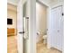Tastefully designed half bath with a neutral color palette at 122 Arrow Ln, Rotonda West, FL 33947