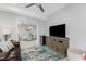 Living room with a flat screen TV and an open concept dining area at 14257 Heritage Landing Blvd # 1115, Punta Gorda, FL 33955