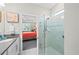 Modern bathroom featuring a glass walk-in shower, neutral walls, and great natural light at 1470 Hyssop Loop, North Port, FL 34289