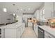 Spacious eat-in kitchen with granite countertops, stainless steel appliances, and ample cabinet space at 1470 Hyssop Loop, North Port, FL 34289