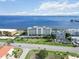 Aerial shot showcasing the condo complex and bay views at 1500 Park Beach Cir # 5E, Punta Gorda, FL 33950