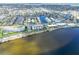 Waterfront condos with a view of residential neighborhood canals on a sunny day at 1500 Park Beach Cir # 5E, Punta Gorda, FL 33950
