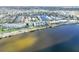 Waterfront condos with a view of residential neighborhood canals on a sunny day at 1500 Park Beach Cir # 5E, Punta Gorda, FL 33950