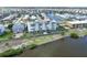 Waterfront building with multiple balconies and landscaping on a sunny day near the water at 1500 Park Beach Cir # 5E, Punta Gorda, FL 33950