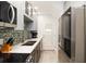 A modern kitchen featuring stainless steel appliances, sleek countertops, and ample cabinet space for a clean, functional design at 1500 Park Beach Cir # 5E, Punta Gorda, FL 33950