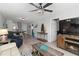 Well-decorated living area with entertainment center and neutral colors and decor at 1500 Park Beach Cir # 5E, Punta Gorda, FL 33950