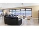 Living room featuring modern furniture and views of the bay at 1500 Park Beach Cir # 5E, Punta Gorda, FL 33950