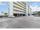 Under building parking garage with multiple spaces available for residents of the condo building at 1500 Park Beach Cir # 5E, Punta Gorda, FL 33950