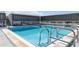 Rooftop pool with bright blue water and steps leading into the pool at 1500 Park Beach Cir # 5E, Punta Gorda, FL 33950