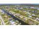 Aerial view showing access to Charlotte Harbor at 15698 Meacham Cir, Port Charlotte, FL 33981