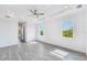Large and open bedroom with ample natural light and serene views of the outdoors at 15698 Meacham Cir, Port Charlotte, FL 33981