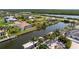 Aerial view of beautiful waterfront house at 15698 Meacham Cir, Port Charlotte, FL 33981