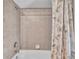 Shower with tile and shower curtain at 1761 Okolona St, North Port, FL 34287
