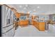 Spacious kitchen featuring stainless steel appliances, granite countertops, and ample cabinet space at 1761 Okolona St, North Port, FL 34287