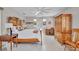 Bright and airy main bedroom suite with wood furniture, ceiling fan, and natural light at 1761 Okolona St, North Port, FL 34287