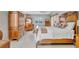Bright main bedroom suite with wood furniture, ceiling fan, and neutral colors at 1761 Okolona St, North Port, FL 34287