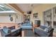Spacious outdoor patio with furniture and easy access to the pool and backyard at 1761 Okolona St, North Port, FL 34287