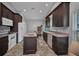 Functional kitchen with white appliances and a view of the adjacent dining area at 1876 Birmingham Blvd, Punta Gorda, FL 33980
