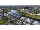Aerial view of a waterfront community with canals, boat docks, and vibrant condos at 2002 Bal Harbor Blvd # 1712, Punta Gorda, FL 33950