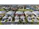 Aerial view of a community with colorful homes, boat docks, and waterfront access at 2002 Bal Harbor Blvd # 1712, Punta Gorda, FL 33950