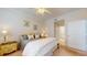 Primary bedroom with natural light, neutral walls and two side tables at 2002 Bal Harbor Blvd # 1712, Punta Gorda, FL 33950