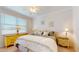 Primary bedroom with natural light, neutral walls and two side tables at 2002 Bal Harbor Blvd # 1712, Punta Gorda, FL 33950