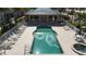 Stunning community pool and hot tub with cabana, surrounded by lush tropical landscaping for ultimate relaxation at 2002 Bal Harbor Blvd # 1712, Punta Gorda, FL 33950