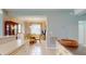 Dining room with a chandelier and a round table with seating for four, adjacent to the kitchen at 2002 Bal Harbor Blvd # 1712, Punta Gorda, FL 33950