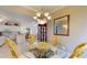 Dining room with chandelier and glass table, open to the kitchen and living spaces at 2002 Bal Harbor Blvd # 1712, Punta Gorda, FL 33950