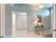 Bright hallway with a decorative table and mirror, offering a glimpse into other areas of the home at 2002 Bal Harbor Blvd # 1712, Punta Gorda, FL 33950