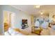 Bright and open living space with bar seating, tiled floor, comfortable sofas, and a relaxing ambiance at 2002 Bal Harbor Blvd # 1712, Punta Gorda, FL 33950