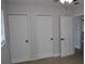Bedroom featuring multiple closets, and a doorway to bathroom at 21275 Austin Ave, Port Charlotte, FL 33952