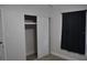 Bedroom featuring a closet with sliding doors and natural light at 21275 Austin Ave, Port Charlotte, FL 33952