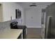 Modern kitchen with white cabinets, quartz countertops, and stainless steel appliances at 21275 Austin Ave, Port Charlotte, FL 33952