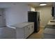 Kitchen view with island and stainless steel appliances at 21275 Austin Ave, Port Charlotte, FL 33952