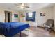 Comfortable bedroom with neutral walls, window, and ceiling fan at 22349 Columbus Ave, Port Charlotte, FL 33954