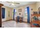 Bedroom with hardwood floors, ample natural light, and dark blue curtains at 22349 Columbus Ave, Port Charlotte, FL 33954