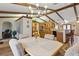 Kitchen flows into dining area with wooden table and natural light at 22349 Columbus Ave, Port Charlotte, FL 33954