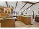 Open kitchen area with island cooktop and solid surface countertops at 22349 Columbus Ave, Port Charlotte, FL 33954